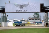 Bently with large overhead sign